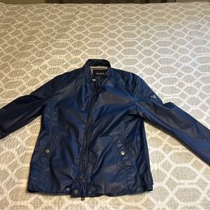 Guess jacket. Polyester. Size small. Brand new. Dark blue